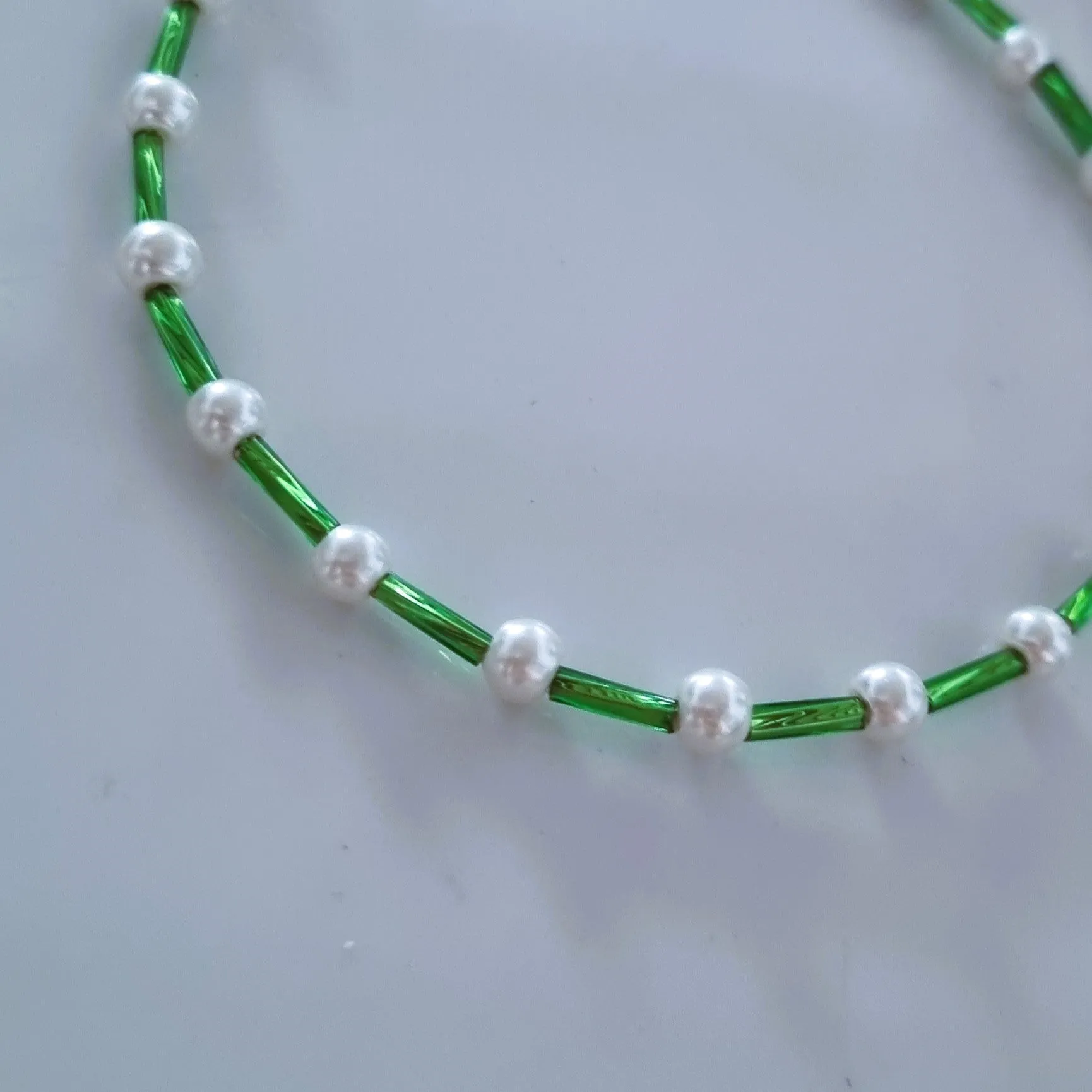 Green and pearly anklets