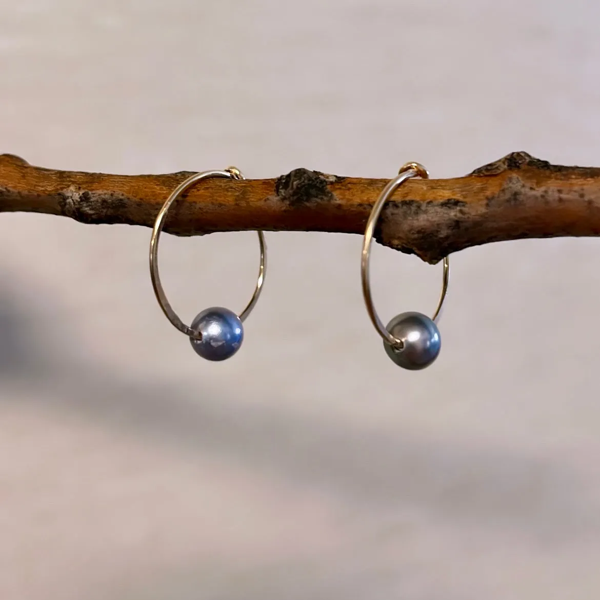 Tiny gray pearl hoops